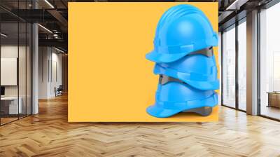 Stack of safety helmets or hard caps for carpentry work on yellow background Wall mural