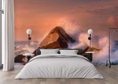 Tropical beach with rocks and big crashing waves Wall mural