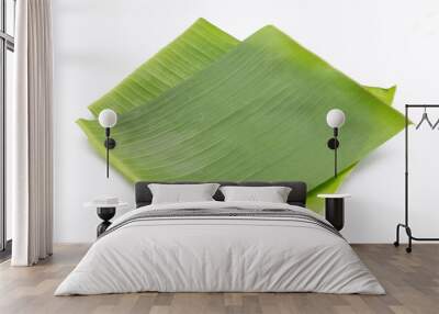 Banana leaves on white background. Wall mural