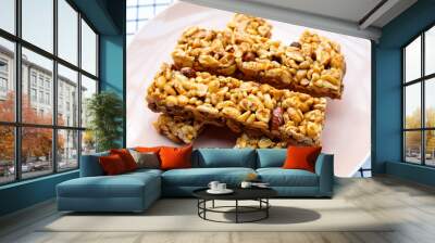 Peanuts butter chocolate bars on plate Wall mural