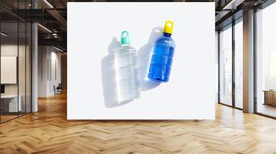 Plastic water bottles on white background. Wall mural