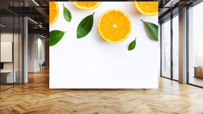 Top view of orange fruits and leaves isolated on white background. Wall mural