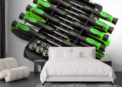 Black and acid green screwdriver set in organizer box isolated on white Wall mural