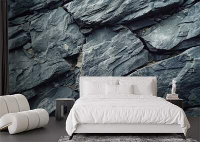 Layered slate rocks in a dark grey hue with rough surface texture Wall mural