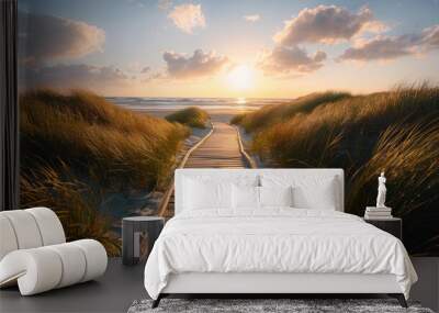 Wooden path leading to the sea with sunset, grassy sand dunes, summer time, golden hour light Wall mural