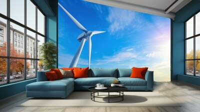 low angle of wind turbine against bright blue sky. renewable or green energy concept. landscape of w Wall mural