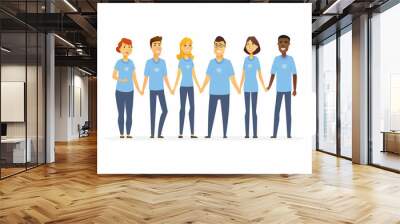 Happy volunteers holding hands - cartoon people characters isolated illustration Wall mural