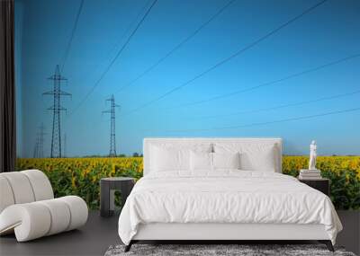 high-voltage power line in the field of sunflowers Wall mural