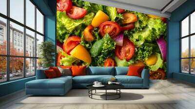 A close-up of a fresh salad with lettuce, tomatoes, bell peppers, and red onion. Wall mural