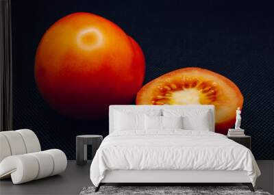 Whole and chopped tomato on black background. Shallow focus, blur, red, 2, food prep, half. Wall mural