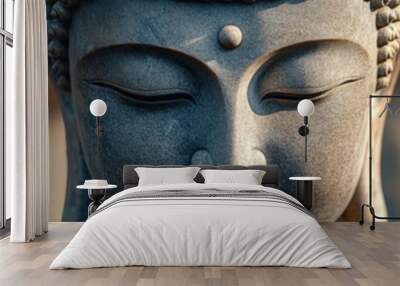 Serene marble Buddha sculpture with closed eyes and tranquil expression Wall mural