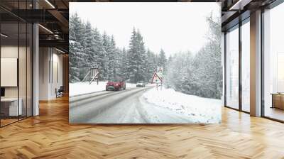 Winter weather, snow on the road. Snow calamity on the road. Snowstorm in Slovakia, mountain pass . Wall mural