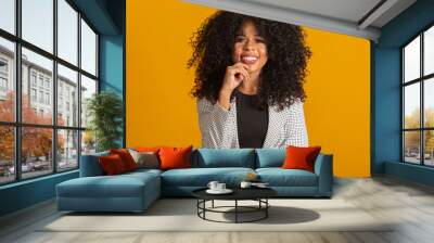 Afro woman smiling at the camera Wall mural