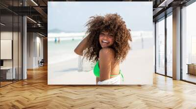 Black afro young cute girl, curly hair, bikini, beach. Afro American summer vacation holiday. Wall mural