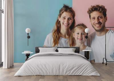 Happy family portrait against pastel background Wall mural