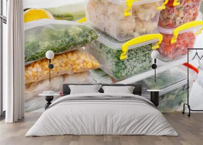 frozen food in the refrigerator. vegetables on the freezer shelves. Wall mural