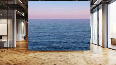 Tranquil sunset seascape with pink sky Wall mural