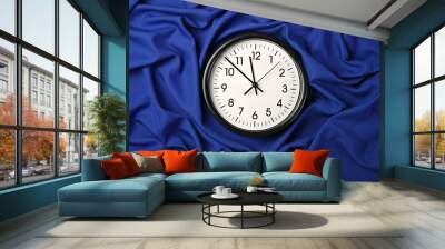 White clock over blue textile folded pleats Wall mural