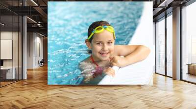 girl with goggles in swimming pool Wall mural