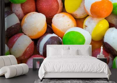 Freeze dried Skittles hard candy split centers, colorful sweet food treat background.	 Wall mural