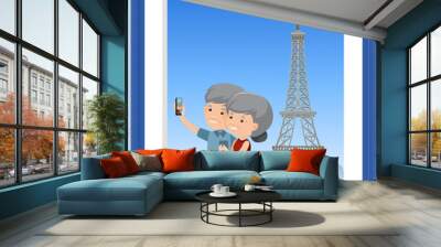 A picture of old couple take a selfie with Eiffel tower Wall mural