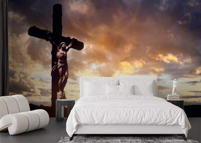 Crucifix cross at sunset background, crucifixion of Jesus Christ Wall mural