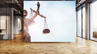 Legal law concept statue of Lady Justice with scales of justice sky background Wall mural