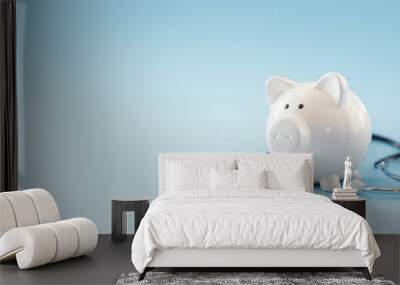 Piggy bank with stethoscope background, medical insurance or money health checkn concept Wall mural