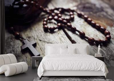 Rosary beads and crucifix cross on holy bible Wall mural