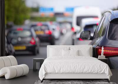 Traffic jam congestion with rows of cars on highway or motorway in rush hour Wall mural