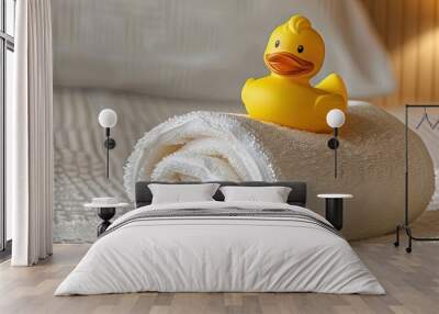 Yellow rubber ducky on a towel Wall mural