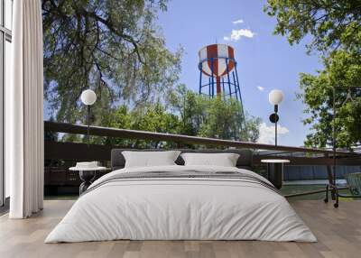 A view of the classic red, white and blue water tower in the idaho sun.  Wall mural