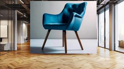 Comfortable blue chair with armrests, perfect for any indoor space. Wall mural