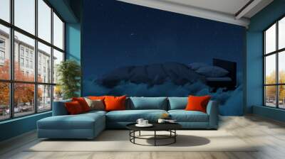 3d rendering of cozy bed over fluffy clouds at night Wall mural