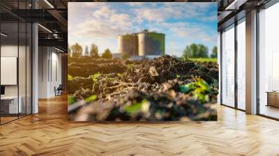 Bioenergy plant converting organic waste to biogas  producing heating and electricity  reducing emissions  showcasing renewable energy and waste management Wall mural