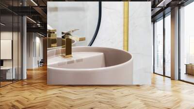 Golden shiny water tap over washbasin in bathroom Wall mural