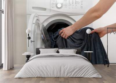 Laundry room interior with washing machine near wall Wall mural