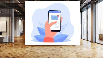 Hand holding cellphone with email symbol on screen. Finger tapping envelope or message flat vector illustration. Communication, network concept for banner, website design or landing web page Wall mural