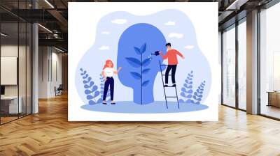 Tiny man and woman watering plant inside abstract head. Support for people in learning flat vector illustration. Mind growth, mental therapy concept for banner, website design or landing web page Wall mural