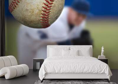 Baseball Pitcher Throwing focus on Ball Wall mural