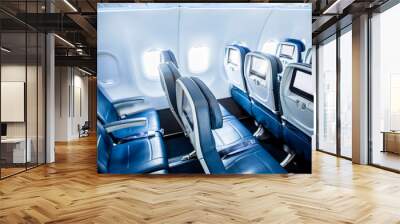 Interior of an empty airplane. View from the back of the plane. Nobody on the plane. Abstract air travel photo. Wall mural