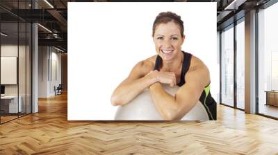 portrait of a happy, healthy fitness woman leaning on a exercise ball. white background Wall mural