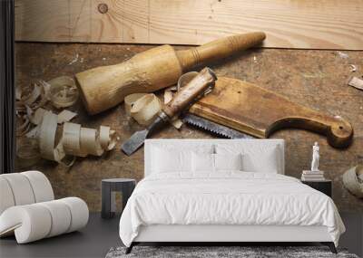 carpenter working with plane on wooden Wall mural