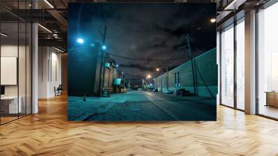 Industrial urban street city night scene with vintage factory warehouses and train tracks Wall mural