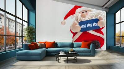 Ho ho ho, fluffy stuffed Santa Claus toy Wall mural