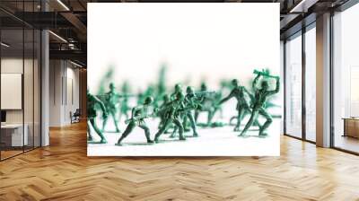 many green army plastic toy soldiers organized on top of a white surface and background, isolated, w Wall mural