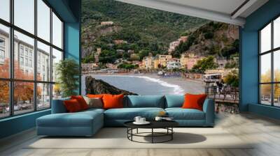 Rock Formation on a Pristine Pebble Beach with Beautiful Clear Blue Water - Monterosso al Mare, Cinque Terre, Italy Wall mural