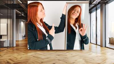 model isolated on plain background hand gesture ok sign Wall mural