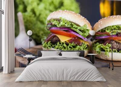 Beef burgers on a wooden board with aromatic spices Wall mural