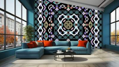 Seamless Eastern ikat pattern.Colorful ornament on a black background. Wall mural